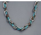 Turquoise Colored Beads and Gun Metal Chain in Asymmetrical Design